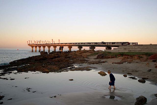 Child playing on the beach