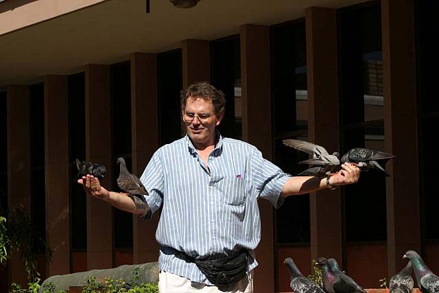 Karl with lots of pigeons
