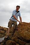 Johan climbing rocks in Plettenberg bay